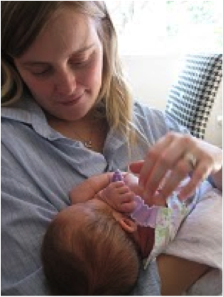 photo of holly mae newborn with mom